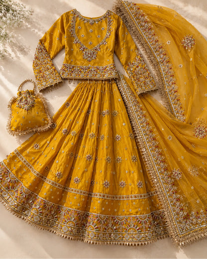 Mustard Golden Embroidered Bridal Lehenga Choli with Net Dupatta & Matching Potli Bag