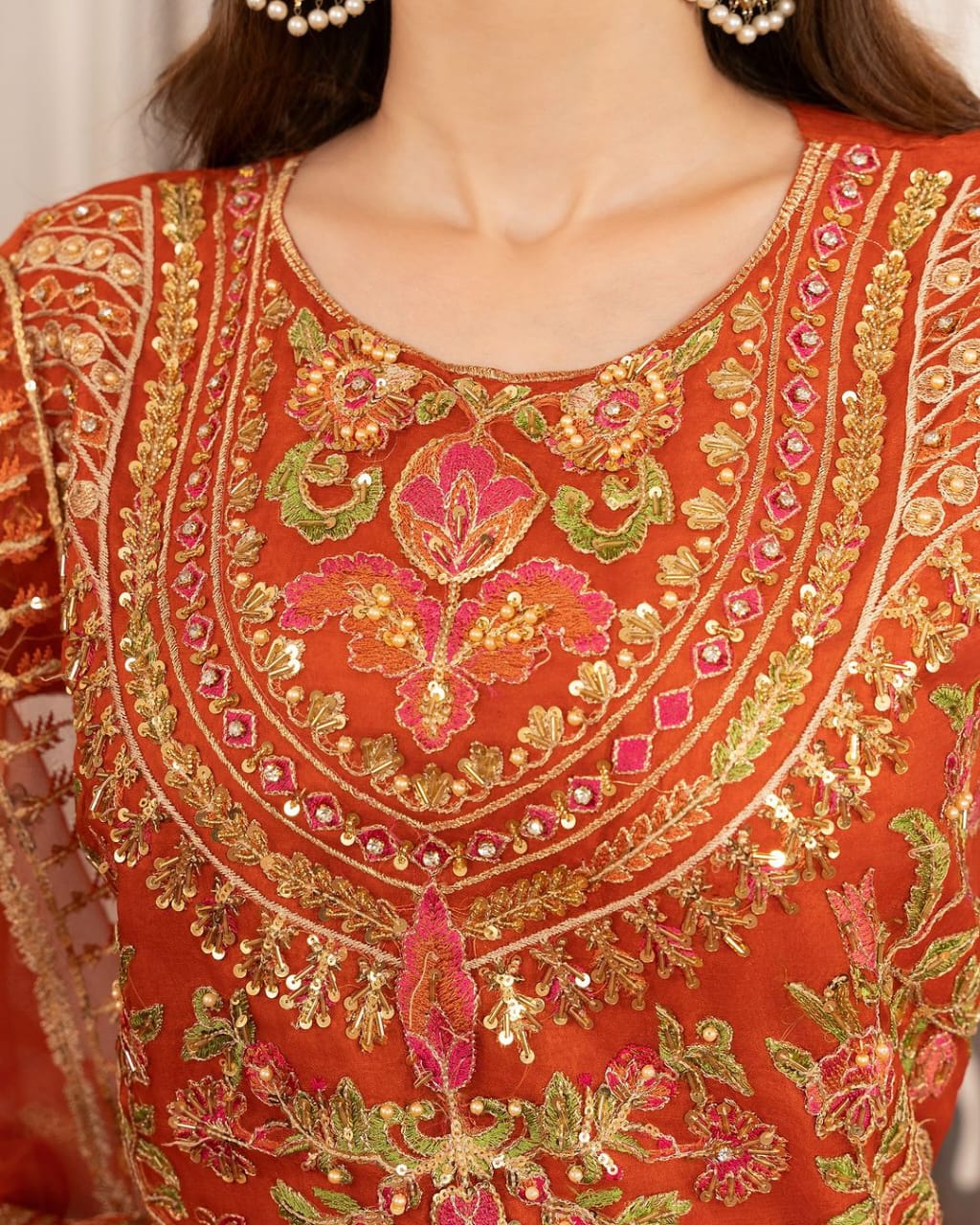 Elegant Orange Embellished Lehenga Set